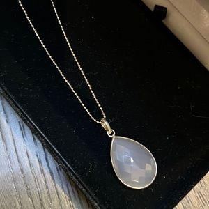 Long necklace with grey pendant